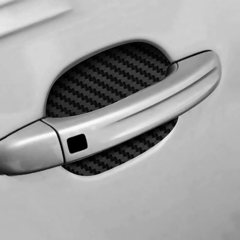 Adesivi protettivi per maniglie delle portiere effetto carbonio – set da 4