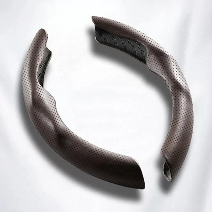 Copertura universale per volante in pelle