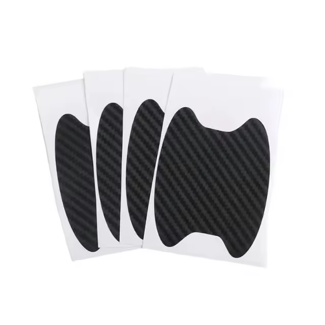 Adesivi protettivi per maniglie delle portiere effetto carbonio – set da 4