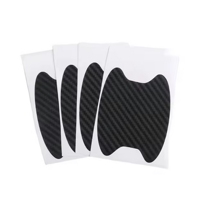 Adesivi protettivi per maniglie delle portiere effetto carbonio – set da 4